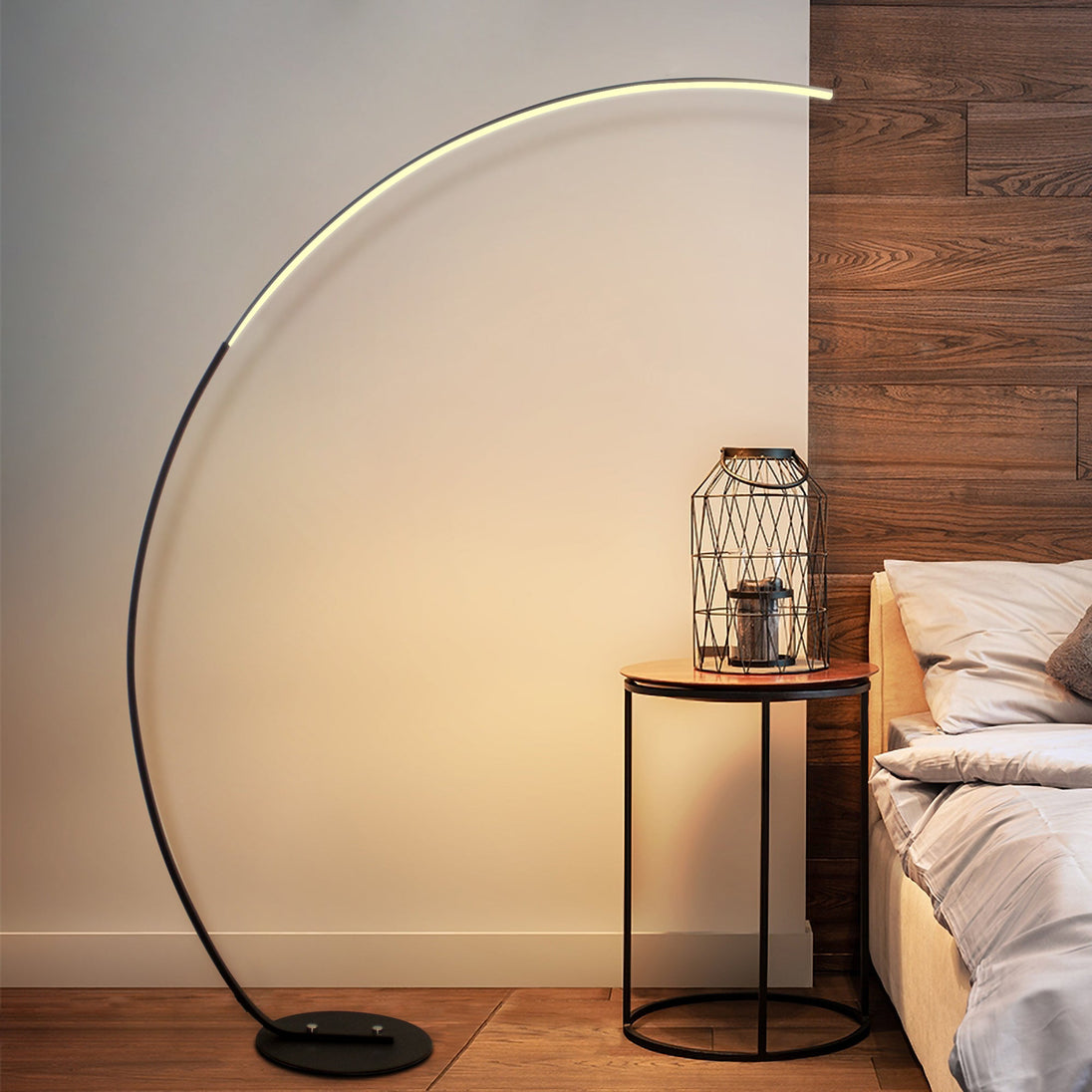 Modern curve floor lamp used as home decor lighting in Bed Room