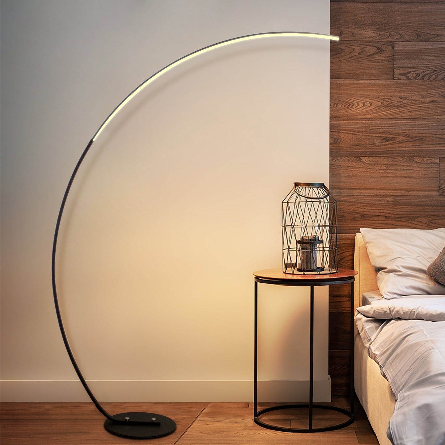 Modern curve floor lamp used as home decor lighting in Bed Room