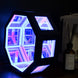 Geometric LED light with colorful design on a dark background