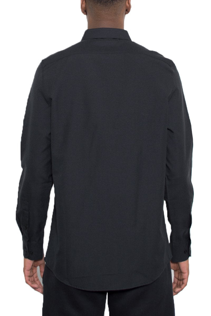 Black shirt worn by a person on a white background