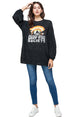 Woman wearing a black oversized sweatshirt with 'Good Vibes Society' text and rainbow graphic, standing against a white background.