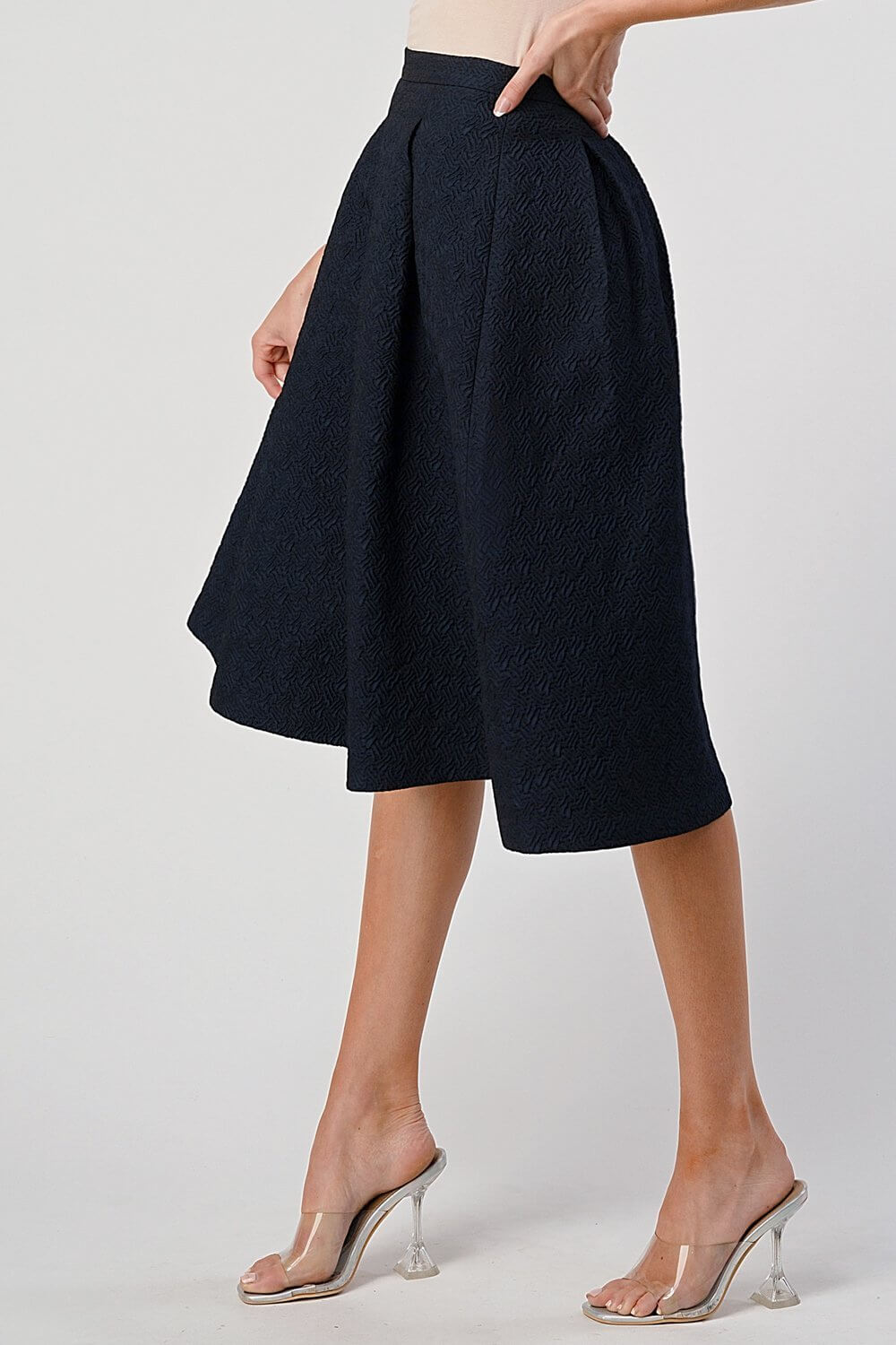 Pleated A-Line Midi Skirt – Pleated Textured Everyday Elegance showcasing high-waisted silhouette and pleated design.