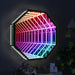 Geometric LED wall light with colorful design on a dark background