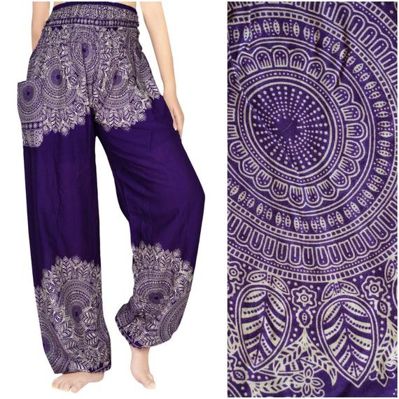 Purple mandala - patterned pants with a close - up of the pattern on a white background.
