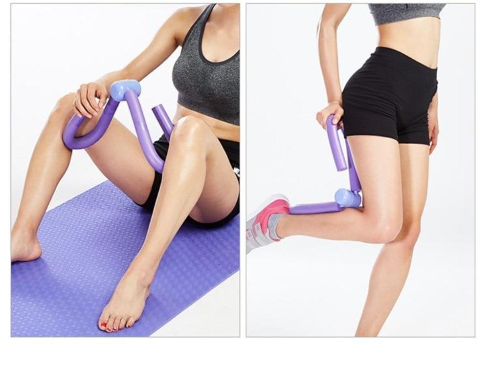 Two people using a purple exercise device on a white background